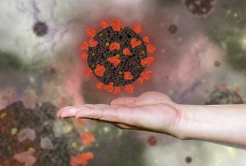 Concept of COVID-19 or 2019-ncov coronavirus on a hand - 378325920