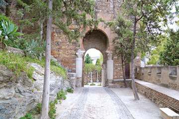 Fototapeta na wymiar The Alcazaba, a palatial fortification located in Malaga, Spain