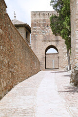 Naklejka premium The Alcazaba, a palatial fortification located in Malaga, Spain