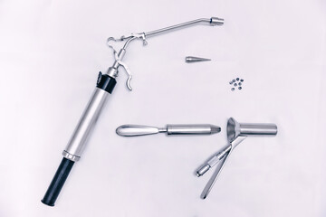 Medical instruments for cosmetic surgery on white table