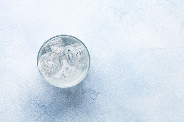 Glass of water with ice cubes