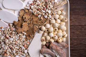 Ingredients of Four Tonics Soup, Four Herb Flavor Soup. Taiwanese traditional food with Job's tears, herbs, pork intestines.