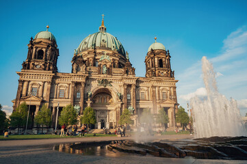 Fototapeta na wymiar Fountain against Berlin Cathedral