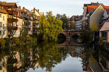 A colourful view of the old houses on the banks of the Pegnitz river in Nuremberg, Bavaria, Germany. October 2014