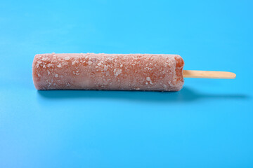 fresh red bean popsicle on a blue background