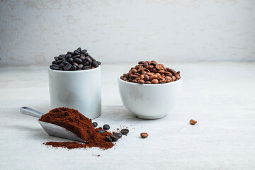 Coffee powder and coffee beans on the white table