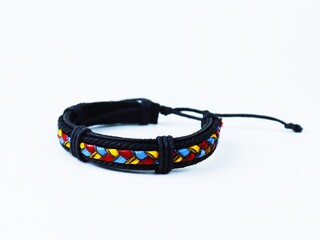 Multicolored handmade braided leather bracelet.
