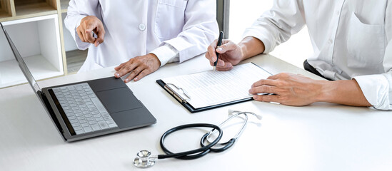 Professor Doctor consulting with patient discussing something and recommend treatment methods, Presenting results on report, Medicine and health care concept