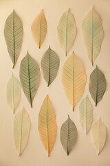 Artificial autumn leaves pattern, closeup, flat lay