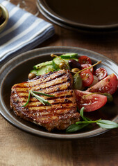 Grilled Turkey Breast with fresh salad. Close up. 