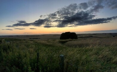 landscape at sunset at avesbury hill england