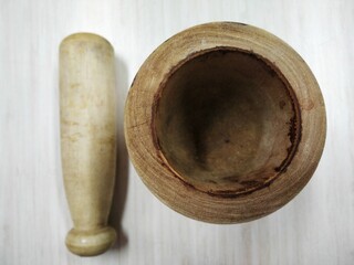 Wooden Mortar and Pestle Set/Khalbatta/ hamandista with a white background