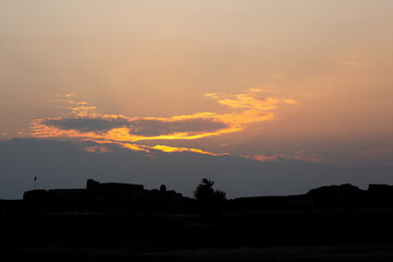 Silhouette of Ancient Bahrain Fort during sunset, Bahrain