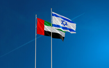 UAE and Israel Flags waving against a blue sky background. United Arab Emirates–Israel signing historic diplomatic deal. Jerusalem and Abu Dhabi relations 2020. 3D rendering