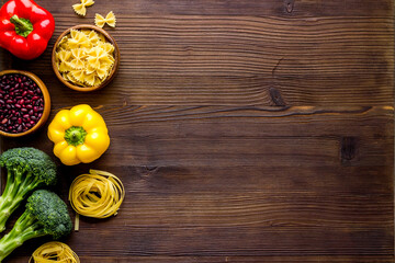 Grocery shopping set with vegetables and herbs, top view
