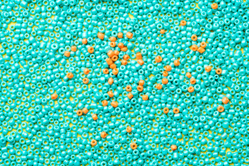 close-up of beads, two colors blue and orange