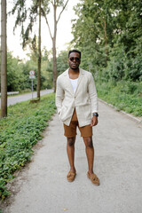 Cute young man posing in different locations. On an island. 