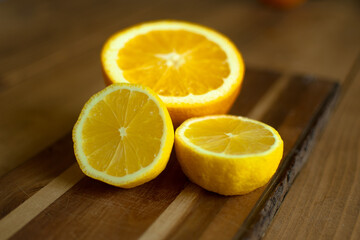 Citrus slices on wooden background