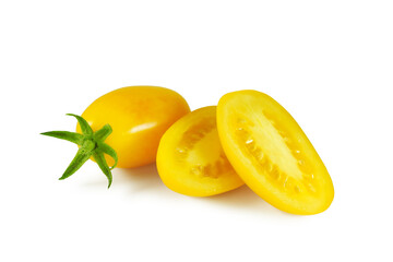 Fototapeta na wymiar Oval yellow tomato and juicy halves isolated on white background 
