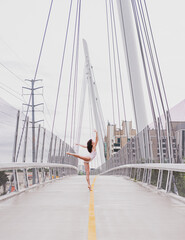 Ballet Dancer on Suspension Bridge