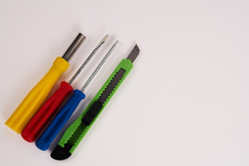 construction tools screwdrivers on a light background equipment for repair industry