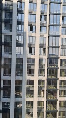 Obraz premium high rise modern building with small balconies