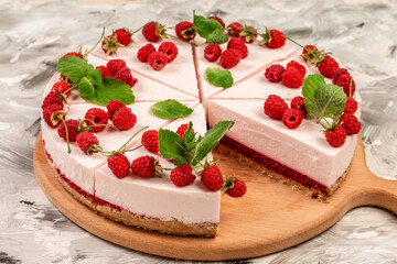 Delicious cheesecake with berries, healthy organic summer dessert pie. snack on a light background, top view