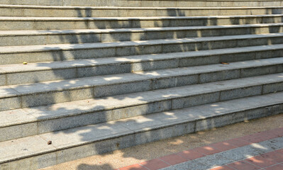 Abstract background of shadows leaf on Step of rock stair with vintage style.