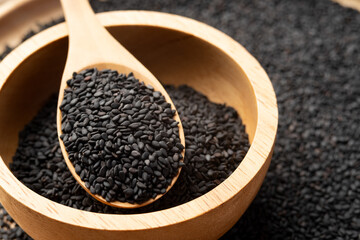 Close up black Sesame on spoon with copy space