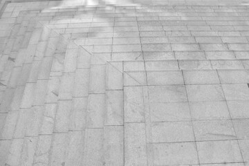 Modern architecture detail. Grunge texture of outdoor staircase. Step of rock stair with vintage style. 