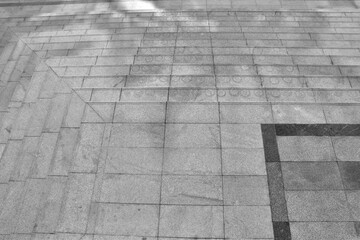 Modern architecture detail. Grunge texture of outdoor staircase. Step of rock stair with vintage style. 