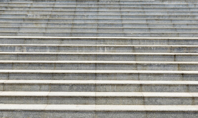 Modern architecture detail. Grunge texture of outdoor staircase. Step of rock stair with vintage style. 