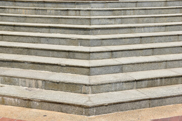Modern architecture detail. Grunge texture of outdoor staircase. Step of rock stair with vintage style. 