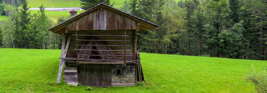 old traditional hay barn on a meadow in the Lesachvalley near Maria Luggau in Carinthia
