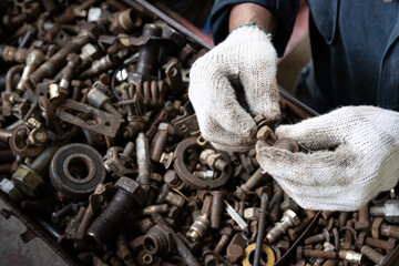 Old hexagonal Head bolt and nut that are going to be recycled