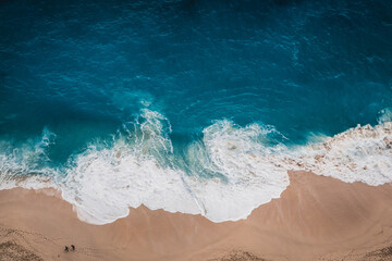 Wild beach, top view, waves
