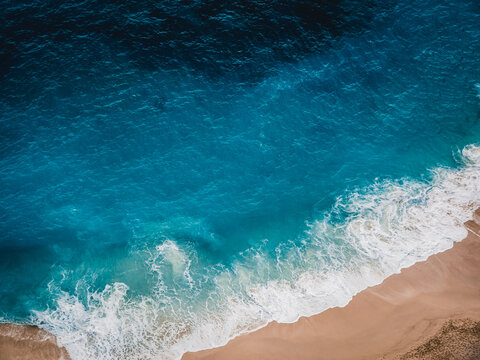 Wild beach, top view, waves