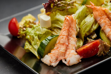 Fresh seafood salad served with prawns (shrimps )