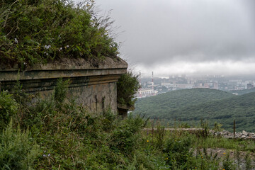 Old abandoned bunker in the woods. Military Fort. Fort Suvorov, Vladivostok, Russia.