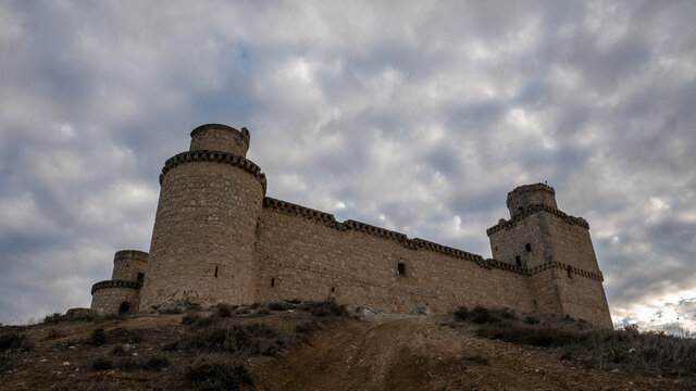 Low angle view of the castle of Barcience in Spain against the cloudy sky
