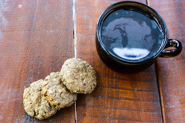 tea and cookies on wooden table