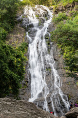 Fototapeta na wymiar Sarika waterfall in the forest of Nakhon Nayok National Park, Thailand.