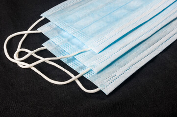 Background concept for news about the novel coronavirus COVID-19 pandemic, antiviral medical mask...