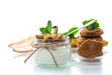 sweet homemade yogurt with fresh bananas and slices of oatmeal cookies