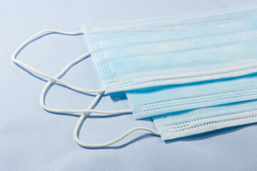 Background concept for news about the novel coronavirus COVID-19 pandemic, antiviral medical mask...