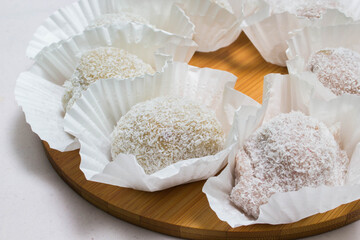 The colorful mochi dessert ice cream on wood plate ,Close Up photo with selective focus.