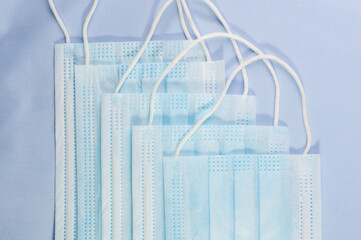 Background concept for news about the novel coronavirus COVID-19 pandemic, antiviral medical mask...