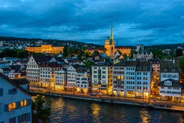 Fototapeta na wymiar Night view at the city and river in the historical center of Zurich, Swizerland.