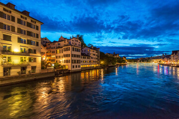 Fototapeta na wymiar Night view at the city and river in the historical center of Zurich, Swizerland.