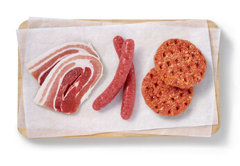 Raw steak in a studio setting, isolated on white